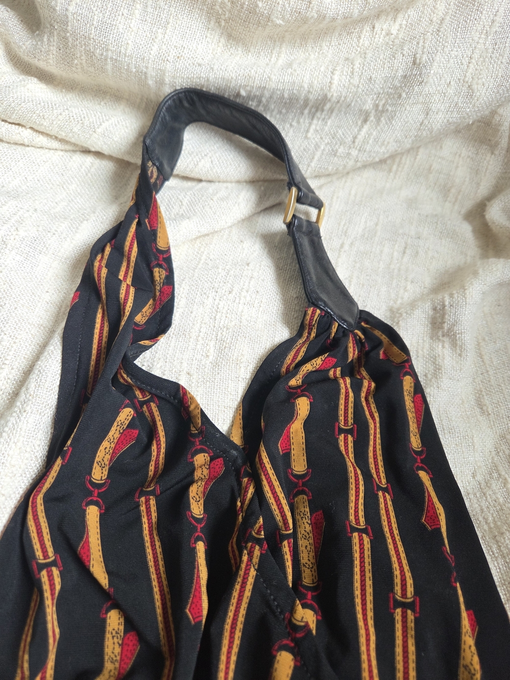 BCBGMaxAzria Black halter style Mini Dress with Gold and Red Chain Print